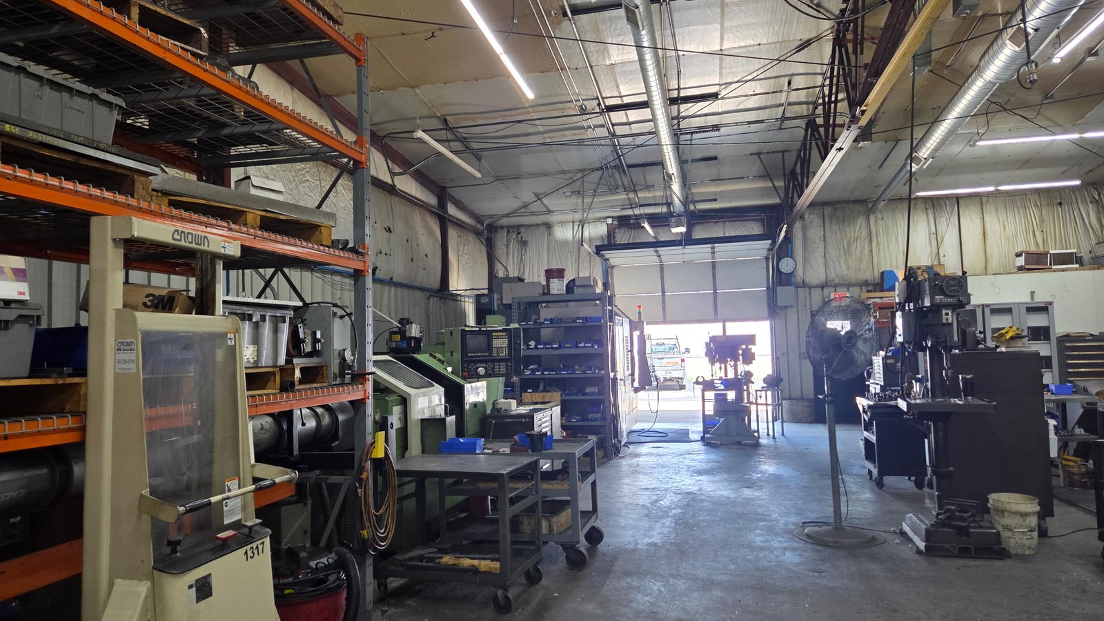 The Westwood Machine & Tool shop floor in Sterling, Illinois — turning and milling cells, tooling, and the open bay